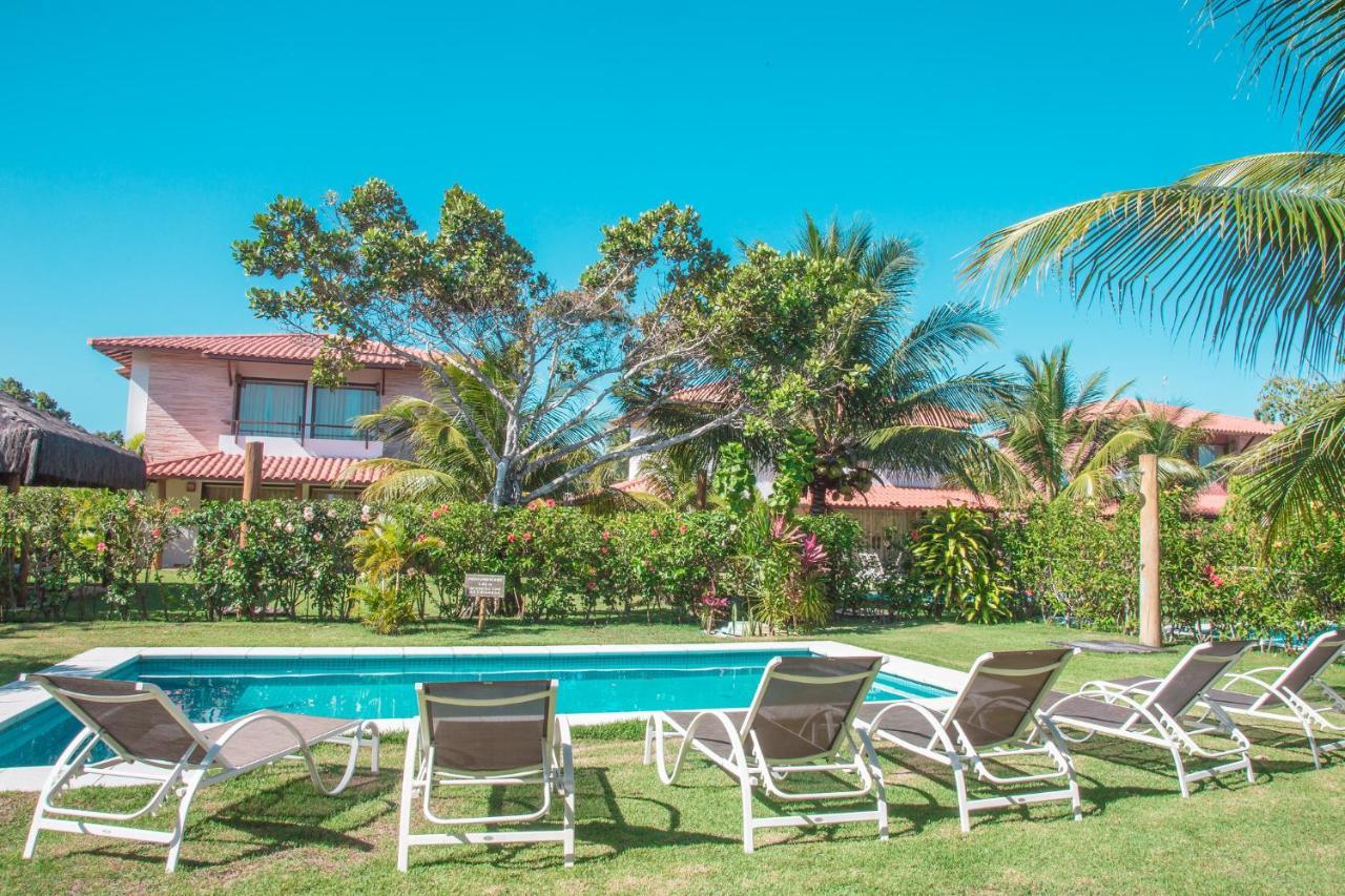 منتجع لا توري الشامل كليًا بورتو سيغورو المظهر الخارجي الصورة A pool at a resort in Punta Cana
